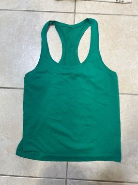 Lululemon swiftly tech racerback tank waist length size 6  green